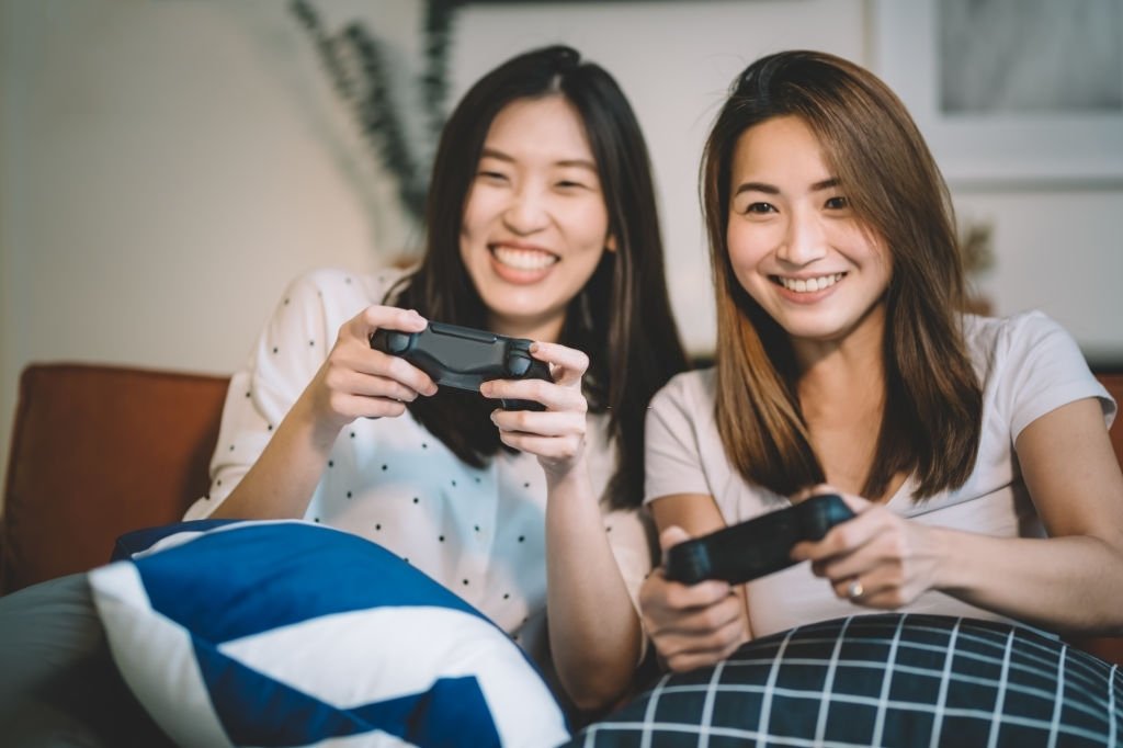Girls paying video games