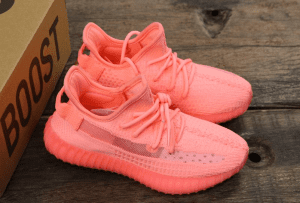 A pair of yeezy 350 pink