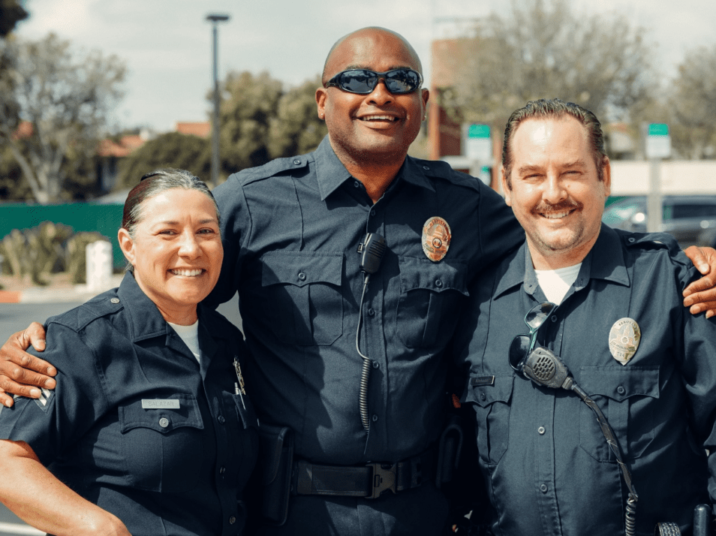Three court officers posing for a picture